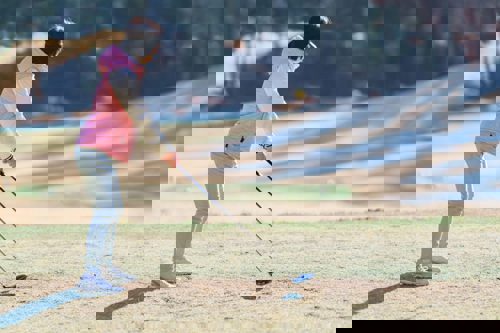 woman-on-golf-course-winter