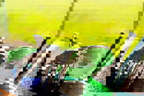 golf-clubs-on-driving-range